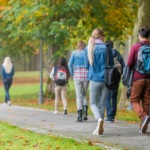 Students walking on a green campus