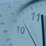 Image of a clock faded on top of an image of a calendar
